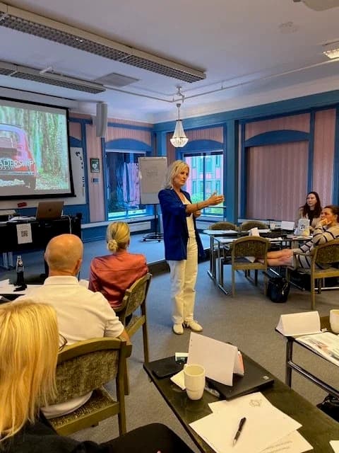 Karin Otterbjörk speaking to a group